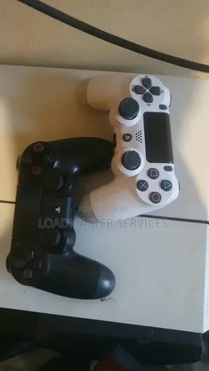 PS4 Console Big With 2 Controllers Chipped