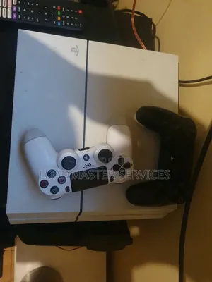 PS4 Console Big With 2 Controllers Chipped