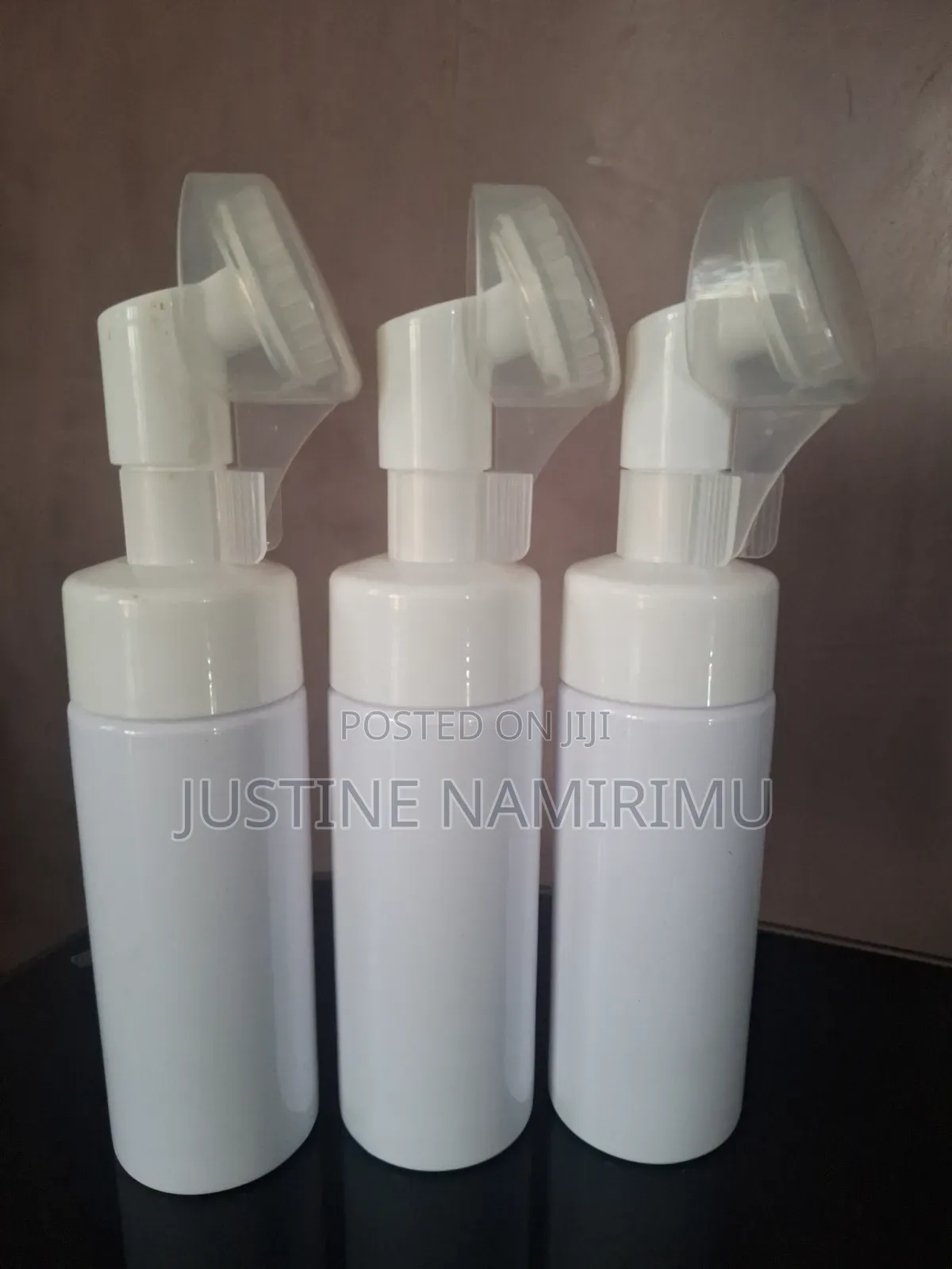 Face Cleanser Bottles With a Brush