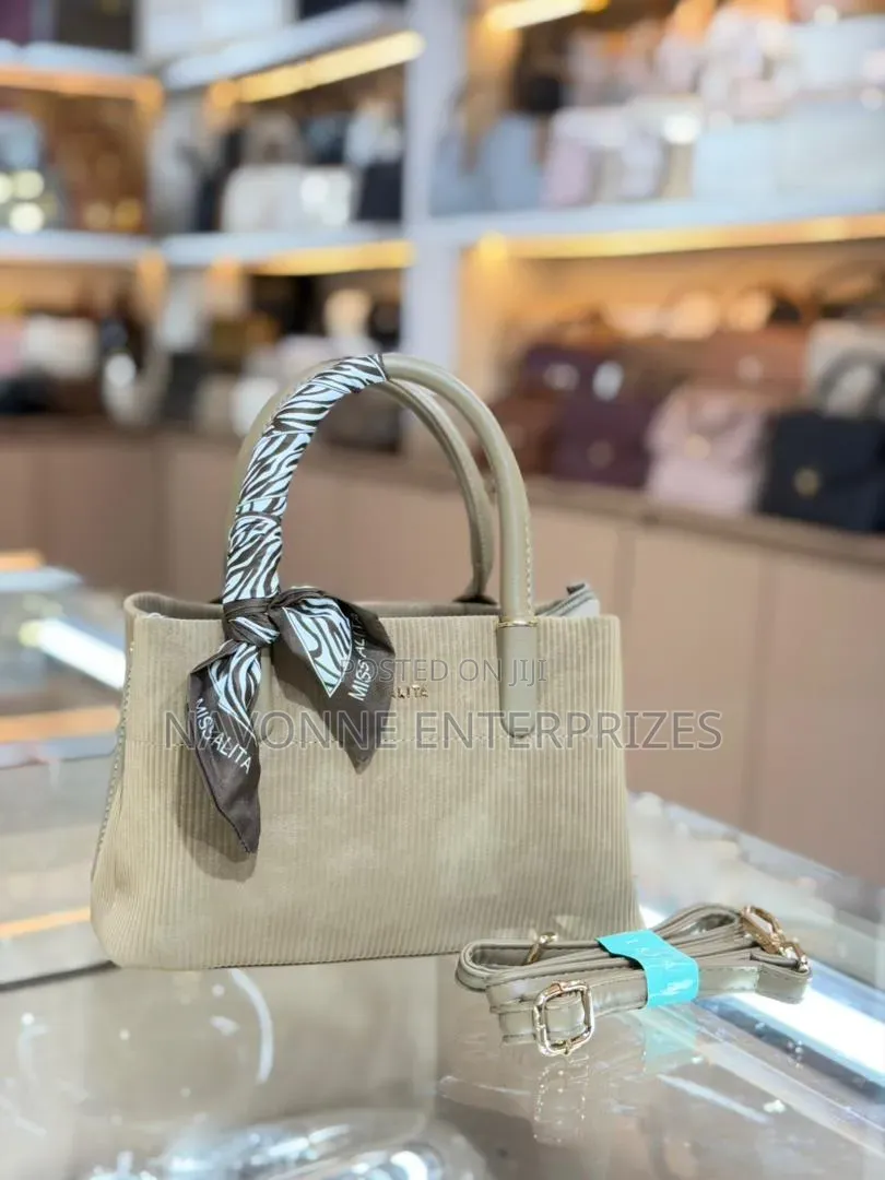 Elegant Textured Corduroy Shoulder Bag With Decorative Scarf Accent
