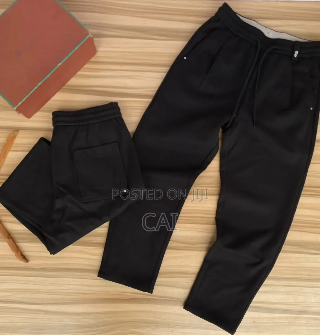 Black, Brown Sweater Pants. Good Fit