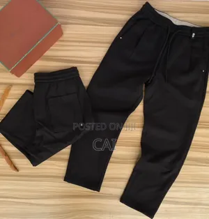 Black, Brown Sweater Pants. Good Fit