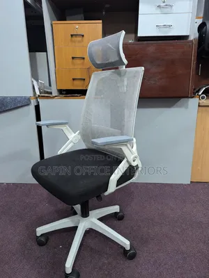 Black and White Mesh Headrest Chair With an Head Support