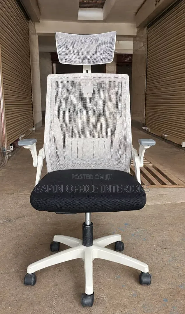 Black and White Mesh Headrest Chair With an Head Support