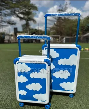 2-Piece Wide-Handle Suitcase Set With a Blue-and-White Sky