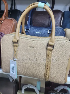 Chrisbella Handbag Featuring Dual-Texture, Metallic Handle Accents.