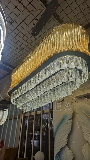 An Oval Layered Crystal and Gold Chandelier
