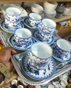 Collection of Vintage Blue and White Porcelain Teacups and Saucers.