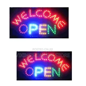 An Illuminated LED Advertising Sign That Displays the Words "WELCOME"