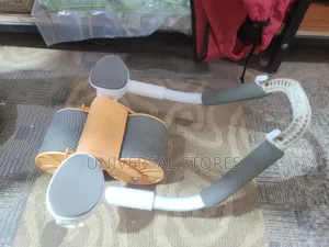Automatic Rebound Ab Roller With Elbow Support.
