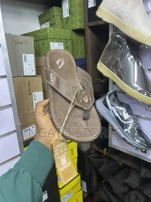 OluKai Leather Flip-Flop Sandals.