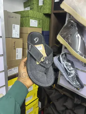 OluKai Leather Flip-Flop Sandals.