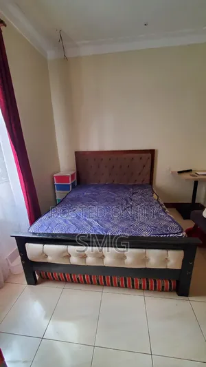 Used 5by6 Bed Frame With It's Mattress (8inch)