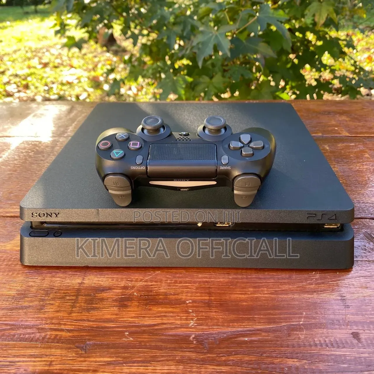 Original Chipped PS4 Slim 500GB — Loaded With 12 Heavy Games FC27, GTA