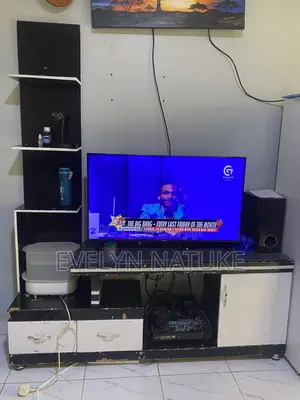 TV Stand and a Hisense TV