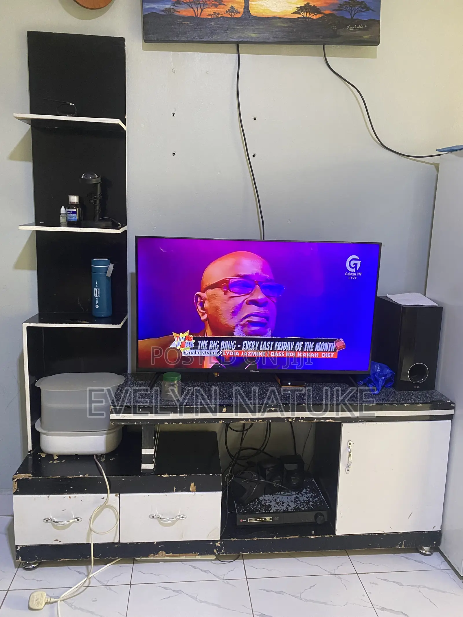 TV Stand and a Hisense TV