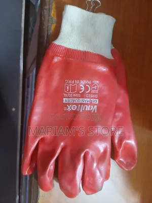 A Red Vaultex Shield PVC Chemical-Resistant Safety Gloves