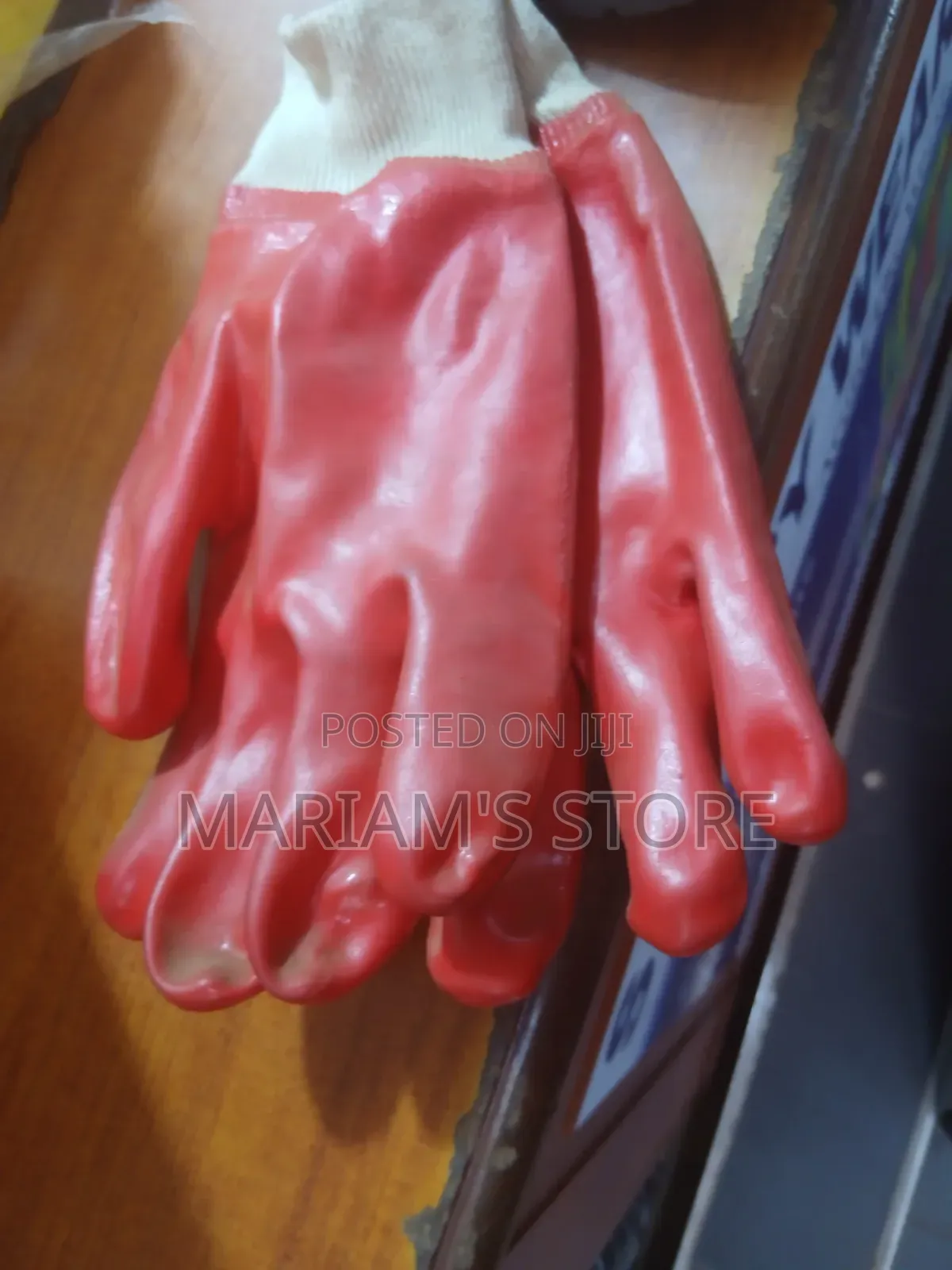 A Red Vaultex Shield PVC Chemical-Resistant Safety Gloves