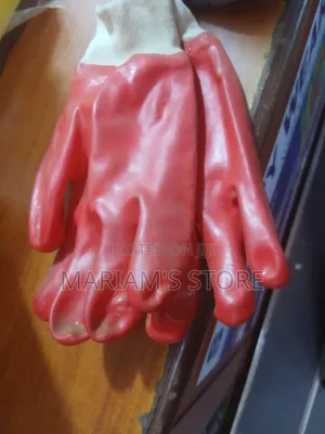 A Red Vaultex Shield PVC Chemical-Resistant Safety Gloves