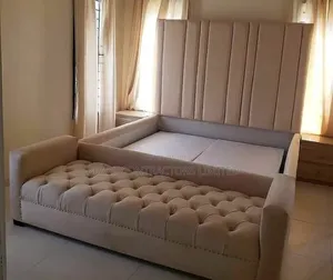 Beds/Dressed Bed With Ottoman and Side Tables.