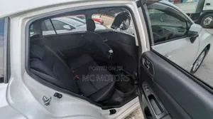 Subaru Impreza 2.0i Limited PZEV 4dr Hatchback AWD (2.0L 4cyl CVT) 2015