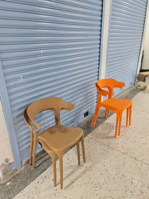 Curvex Orange Plastic Chairs Plastic Chairs Armrest