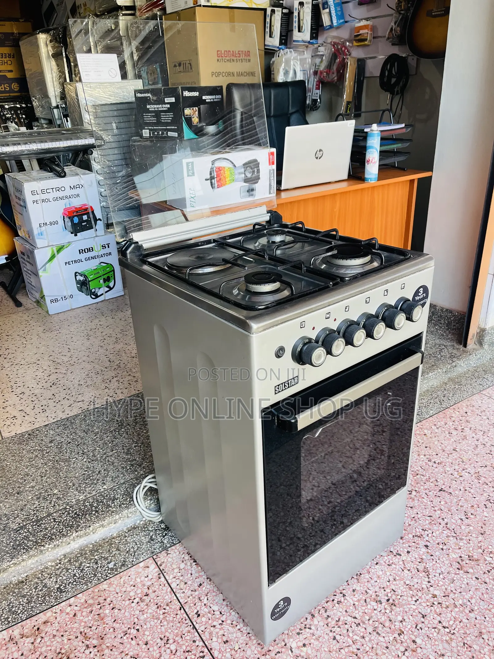 Imported Used Solstar 3+1,electric and Gas Standing Cooker
