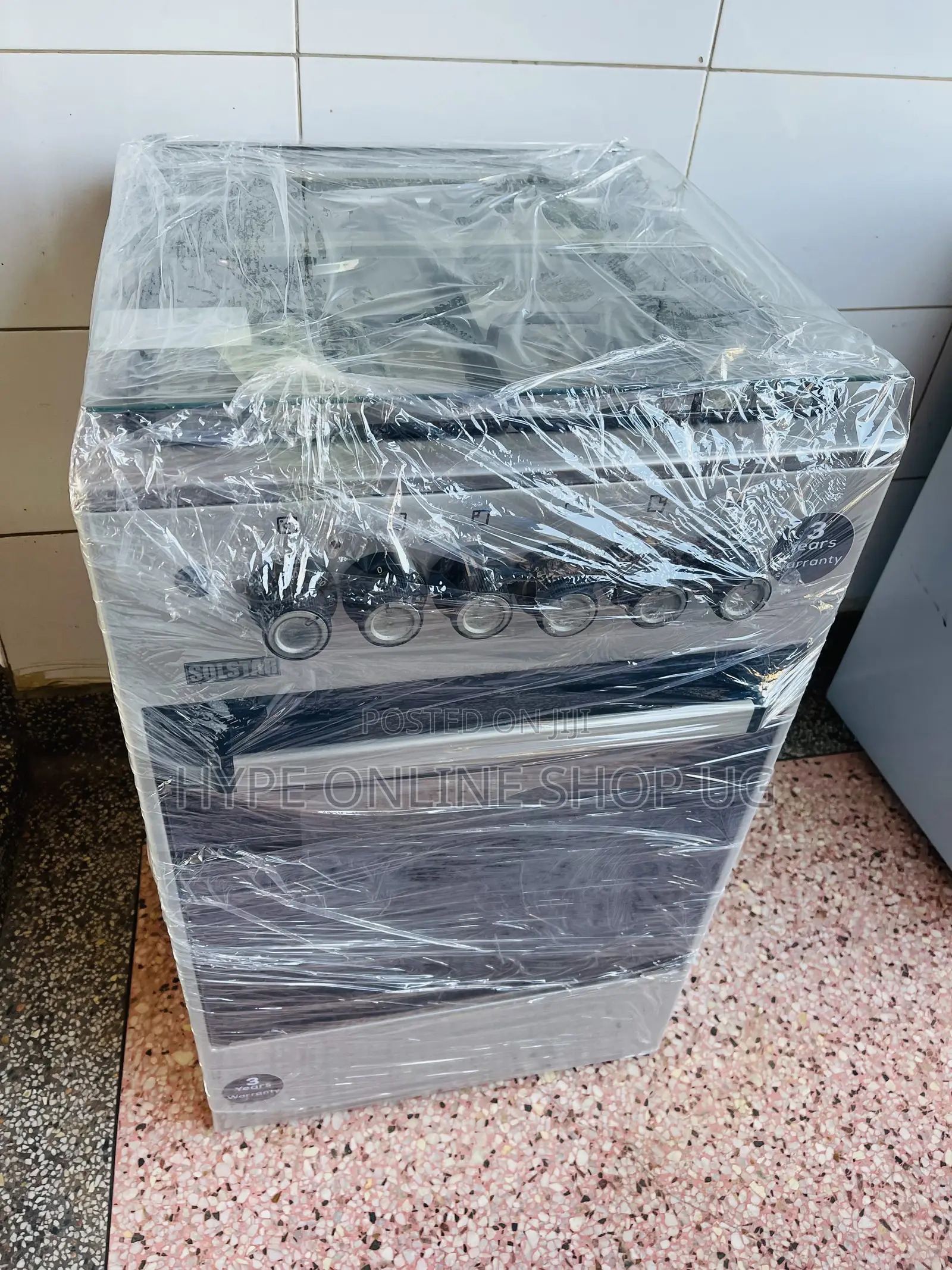 Imported Used Solstar 3+1,electric and Gas Standing Cooker