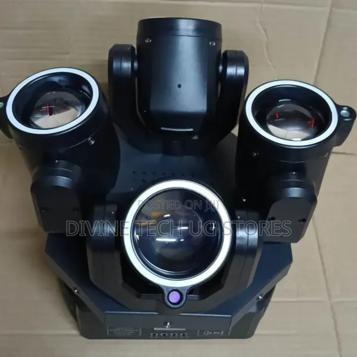 Shows a 4-Head Multi-Beam Spider Moving Head Stage Light