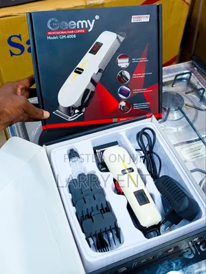 Geemy Hair Clipper Adjustable Blades Combs Charger Lubricant