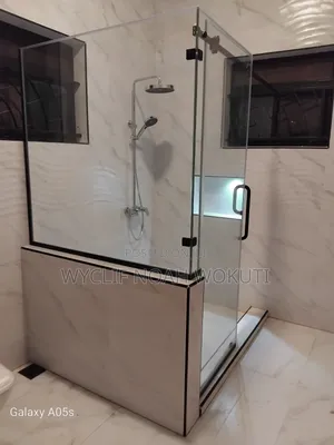 Clear Shower Cabin With a Sliding Shutter