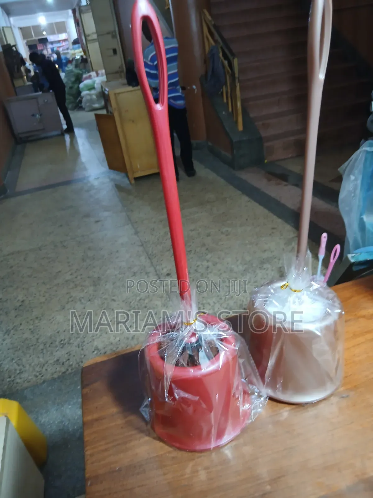 Plastic Toilet Brush Set With a Matching Holder.