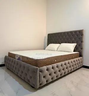 Beds/Fully Tufted Chesterfield Bed.