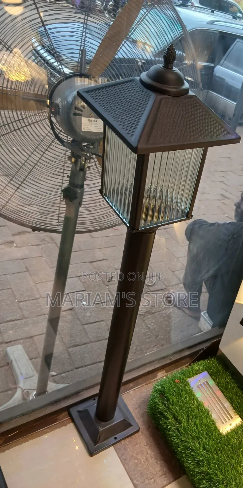 Outdoor Post Light, Fluted Glass Panels and a Textured Pyramid Cap.