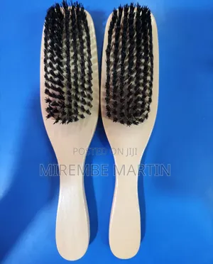 A Pair of Wooden-Handled Hair or Wave Brushes