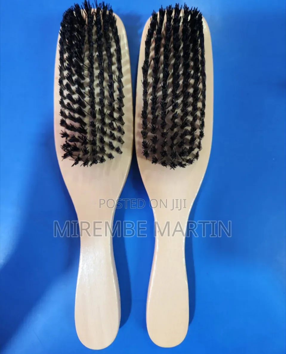A Pair of Wooden-Handled Hair or Wave Brushes