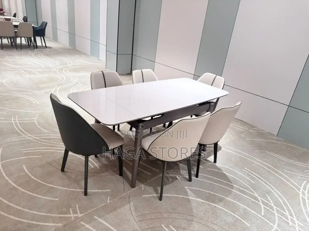 Six Seaters Glass Dinning Table