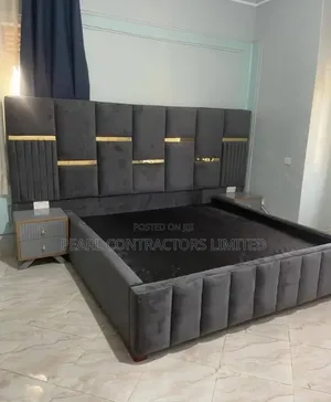 Beds/Upholstered Bed With Gold Strips and Side Tables.