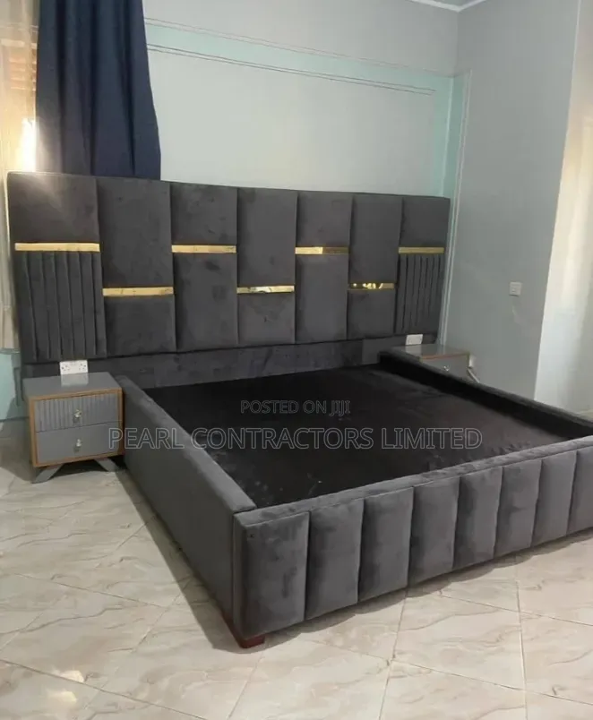 Beds/Upholstered Bed With Gold Strips and Side Tables.