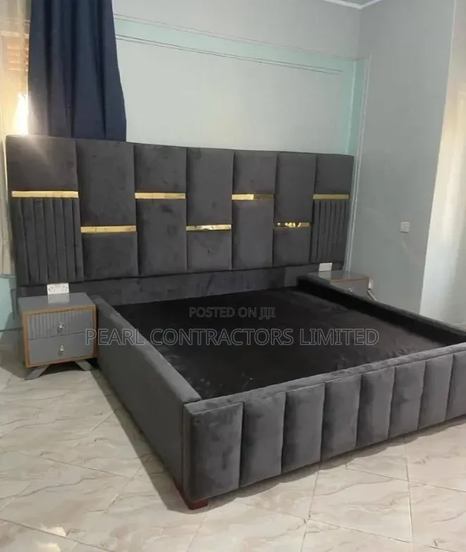 Beds/Upholstered Bed With Gold Strips and Side Tables.