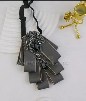 A High-End Set Including a Bow Tie, Bowknot, and Lapel Flower.
