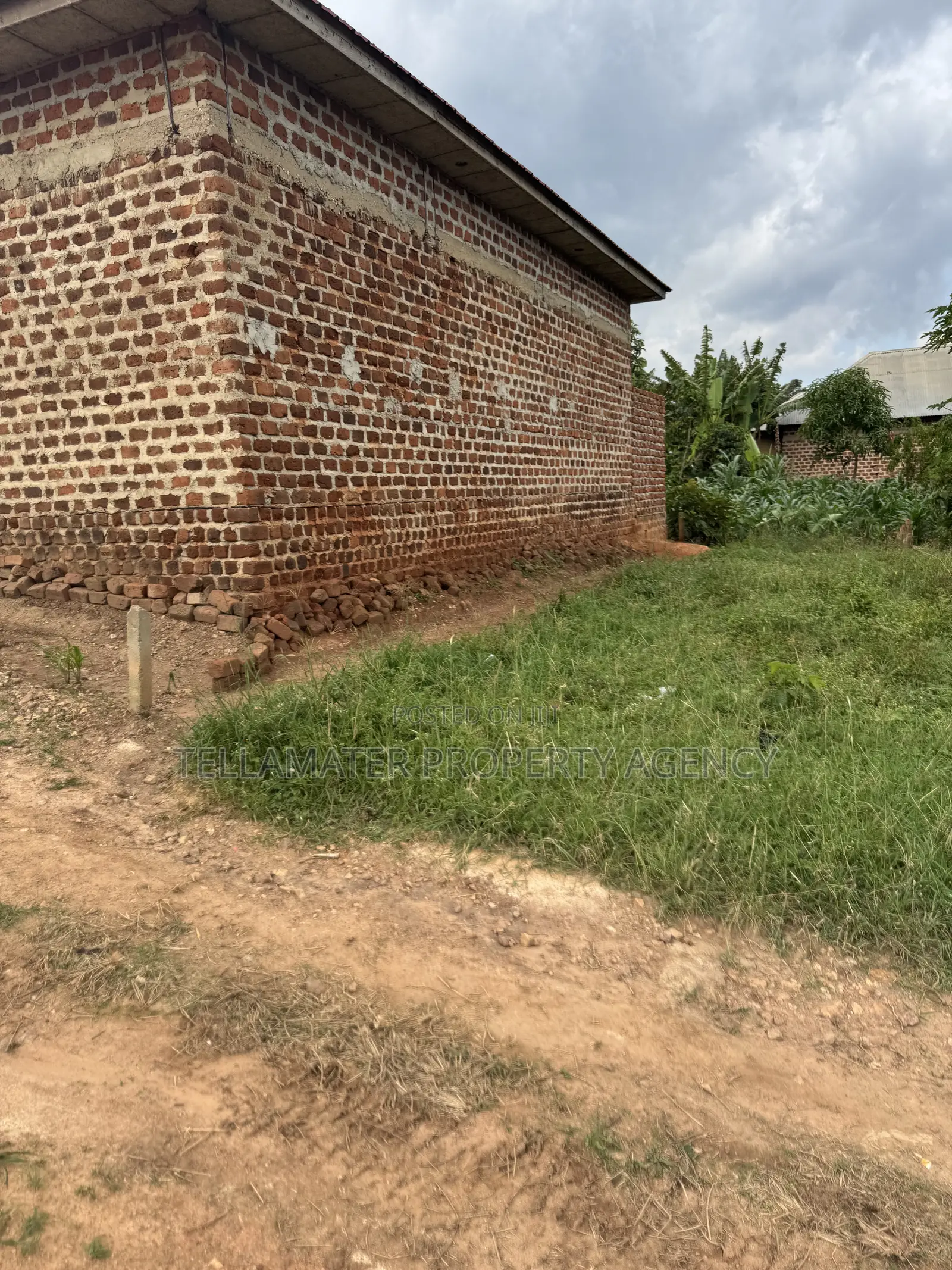 47by100ft Tarmac Road Plot at Kakoola-Kyabakadde for Sale