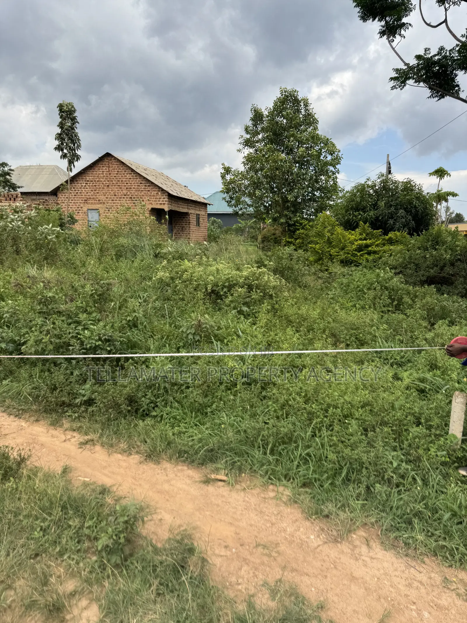 47by100ft Tarmac Road Plot at Kakoola-Kyabakadde for Sale