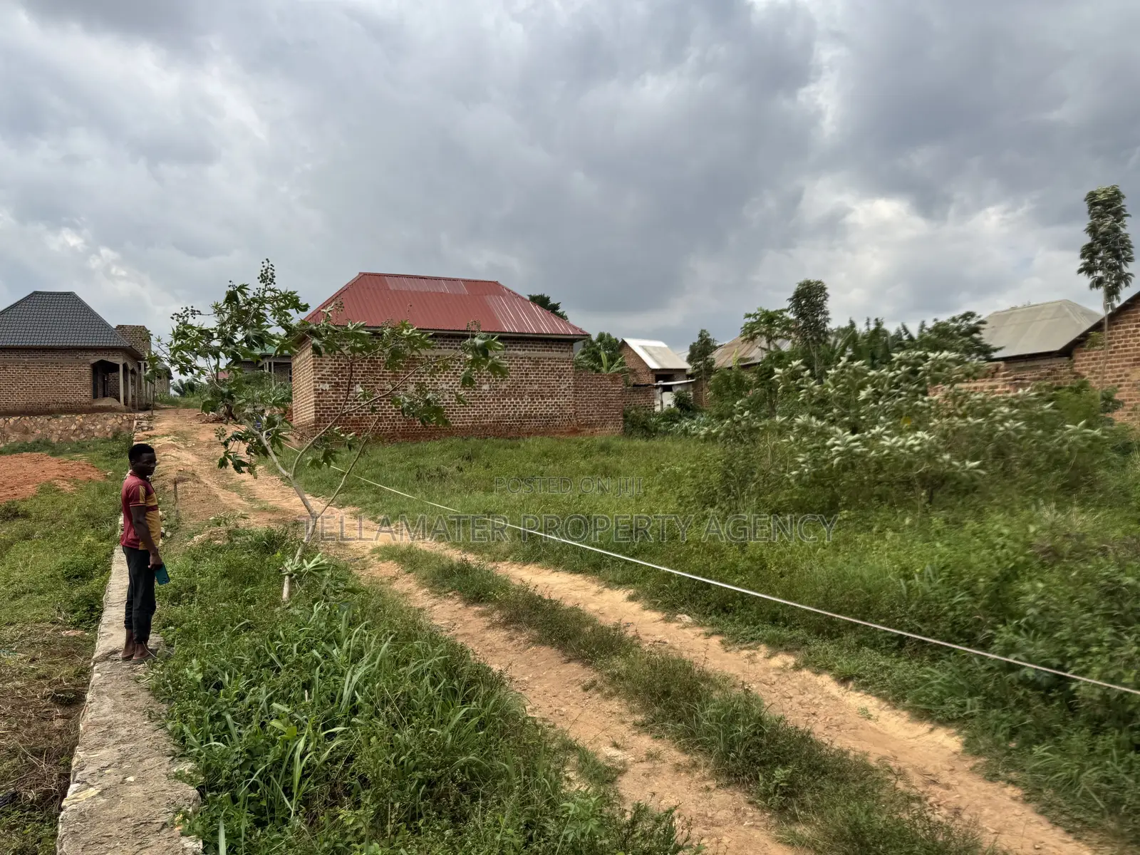 47by100ft Tarmac Road Plot at Kakoola-Kyabakadde for Sale