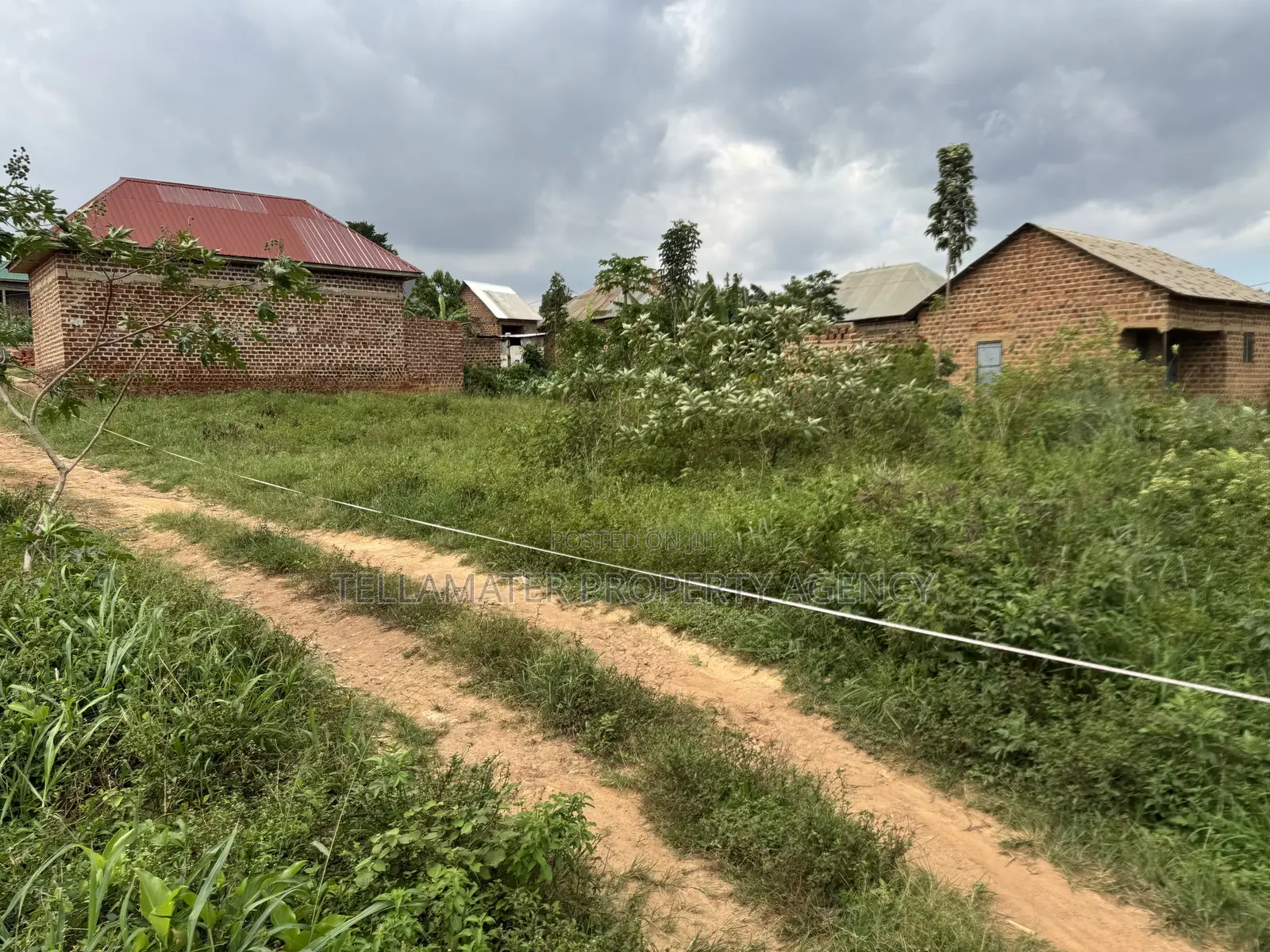 47by100ft Tarmac Road Plot at Kakoola-Kyabakadde for Sale