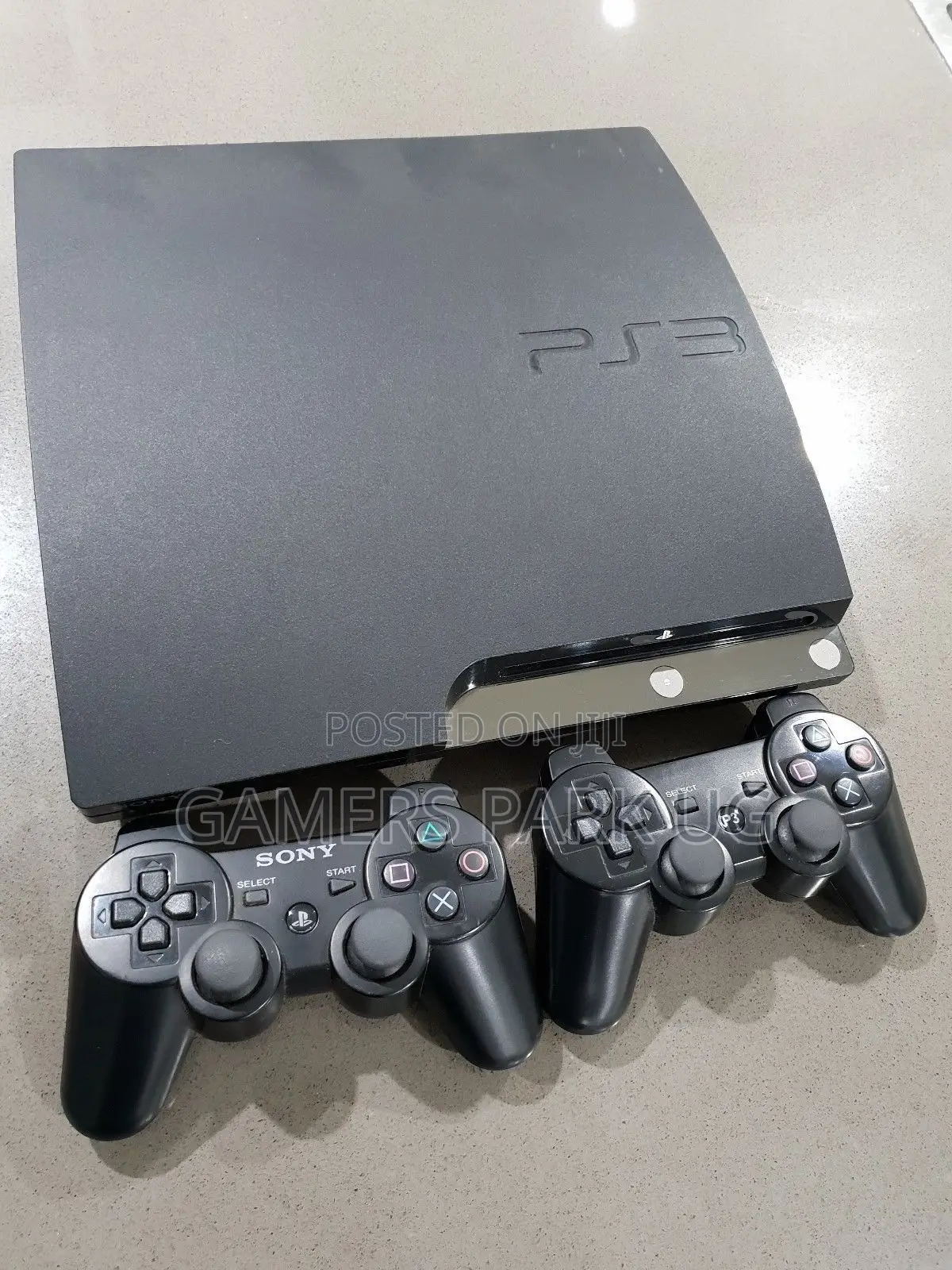 PlayStation 3 Slim With 15 Games Installed and Accessories