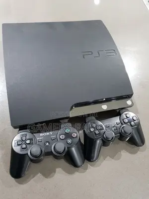 PlayStation 3 Slim With 15 Games Installed and Accessories