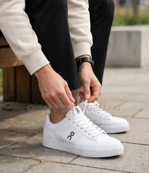 Clean White Casual Sneakers Feature a Distinct Logo on The