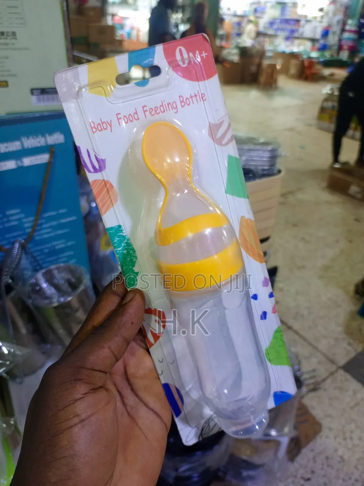 Squeeze-Style Baby Food Feeding Bottle With a Spoon