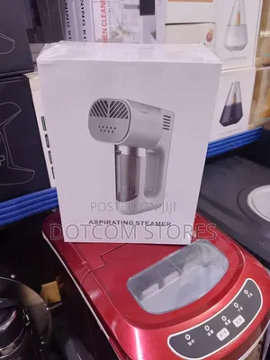 A 3-in-1 Portable Aspirating Garment Steamer & Vacuum Cleaner.